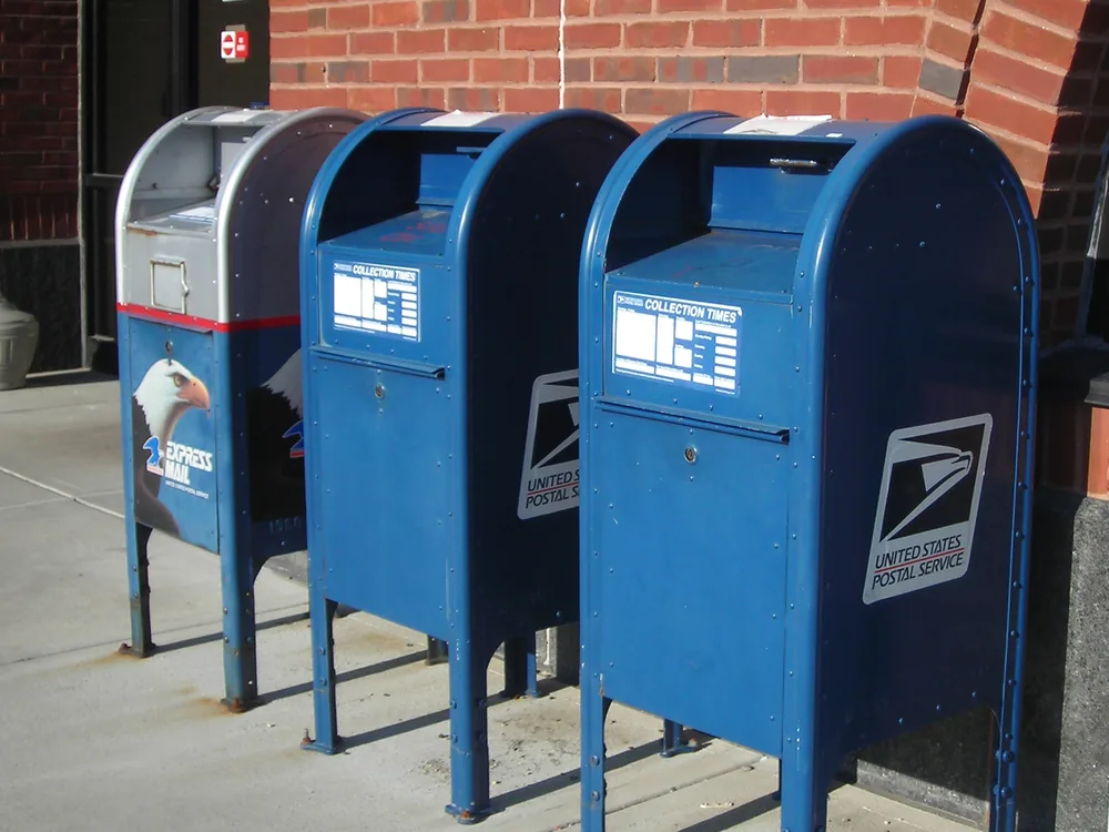 A bank of USPS post-office boxes at a post office